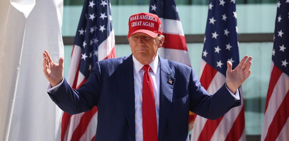 Trump speaking behind presidential podium