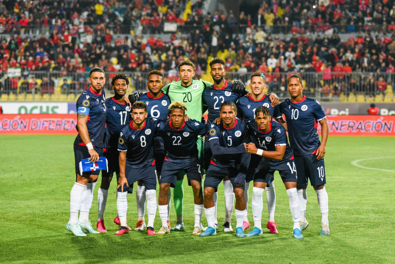 Soccer team posing on field