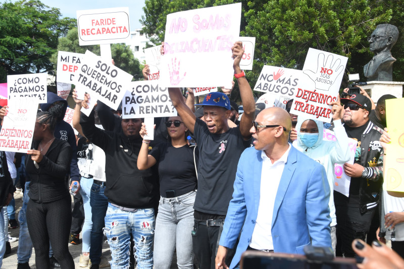 Protesters with signs at demonstration