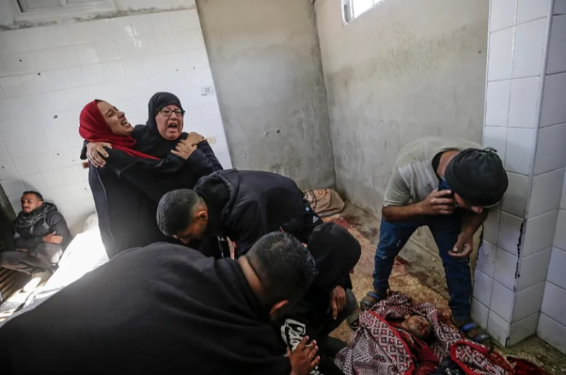 Family mourns in Gaza shelter