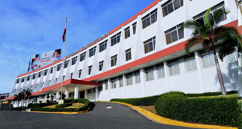 Modern white building with red trim