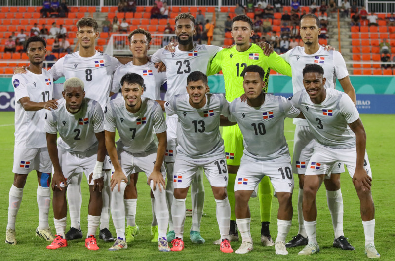 Soccer players lined up on field