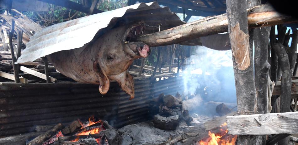 Cerdo asado a la leña