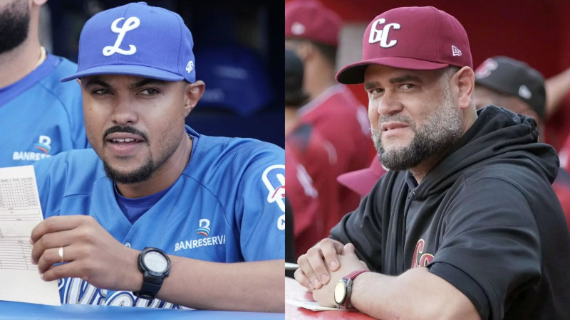 Dos peloteros conversan en el dugout